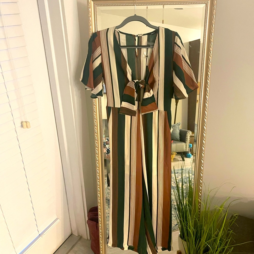 Adorable fall colored jumpsuit.